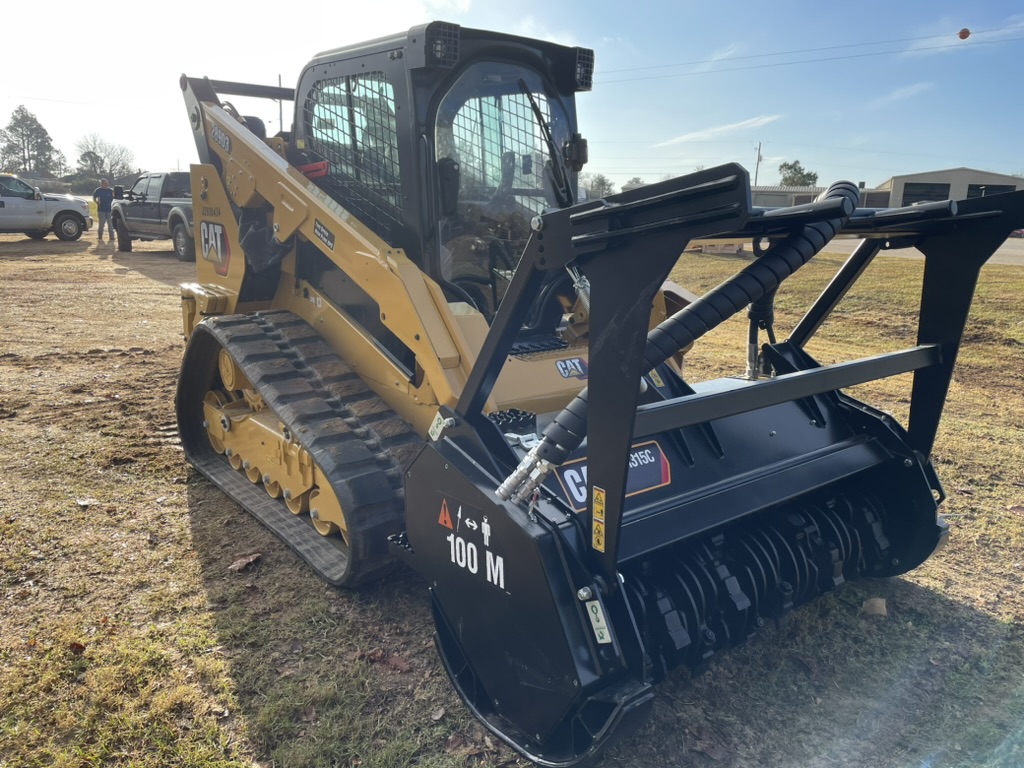 CAT compact track loader with mulching head, side view