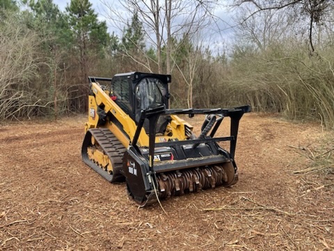 Land clearing operation in wooded area
